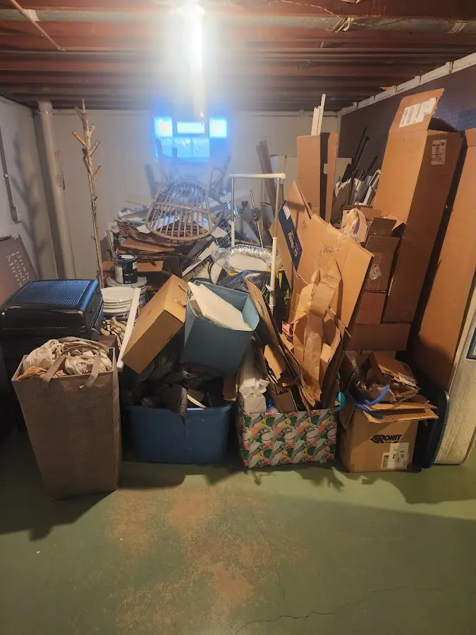 Roll-off dumpster container at job site for Roll Off Dumpster Rental in Woodstock